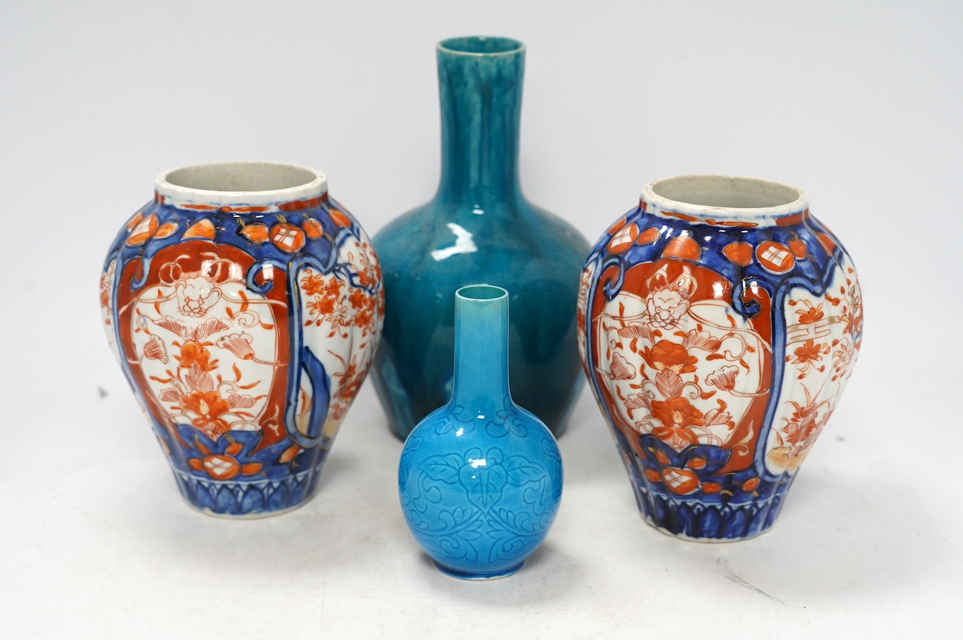Two Japanese turquoise glazed vases and two Imari vases, tallest 21cm high (4). Condition - turquoise vases good, a chip to top edge of one Imari vase